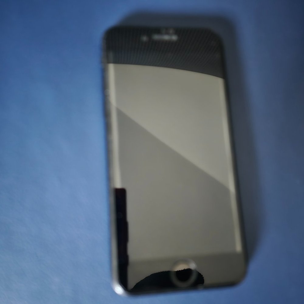 iPhone SE (2nd generation) with cover and